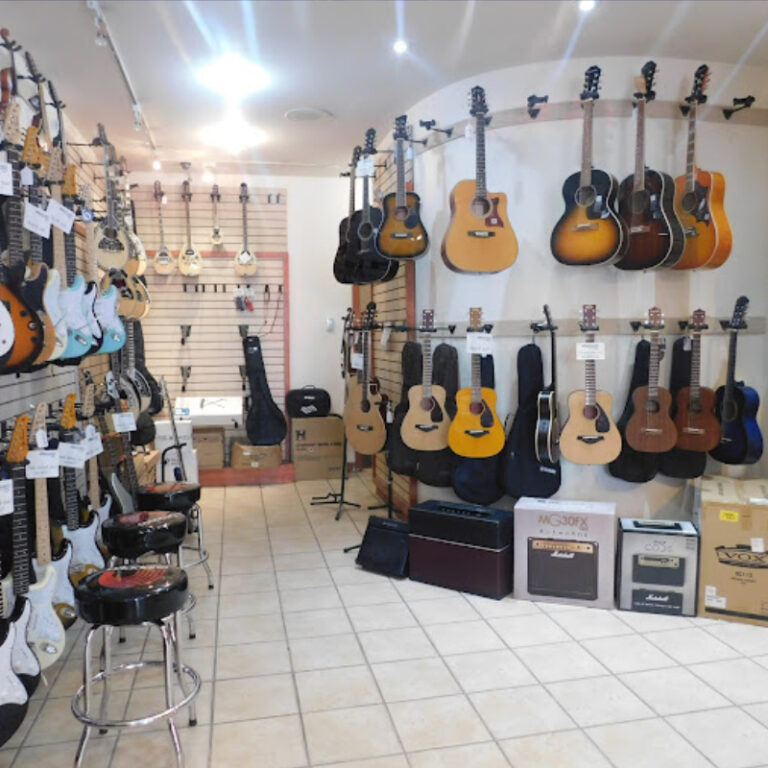 guitars displayed in a guitar store