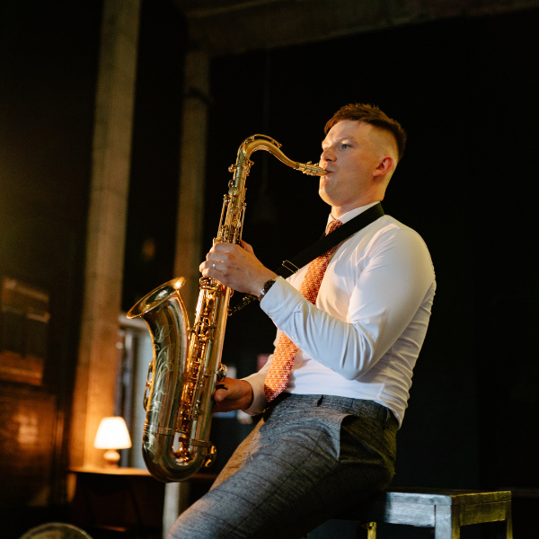 student performing the saxophone live in Toronto