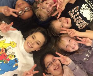 happy kids during a music lesson