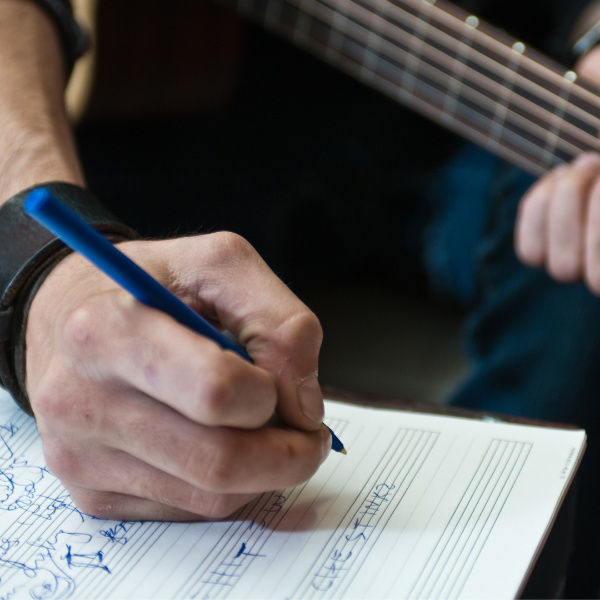 student practicing songwriting during a songwriting lesson in Toronto