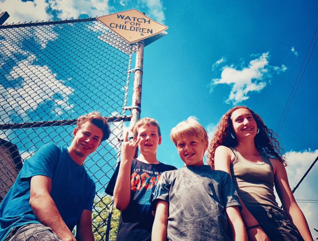 Teen band programs in Toronto at Elite Music Academy featuring students during a band photoshoot